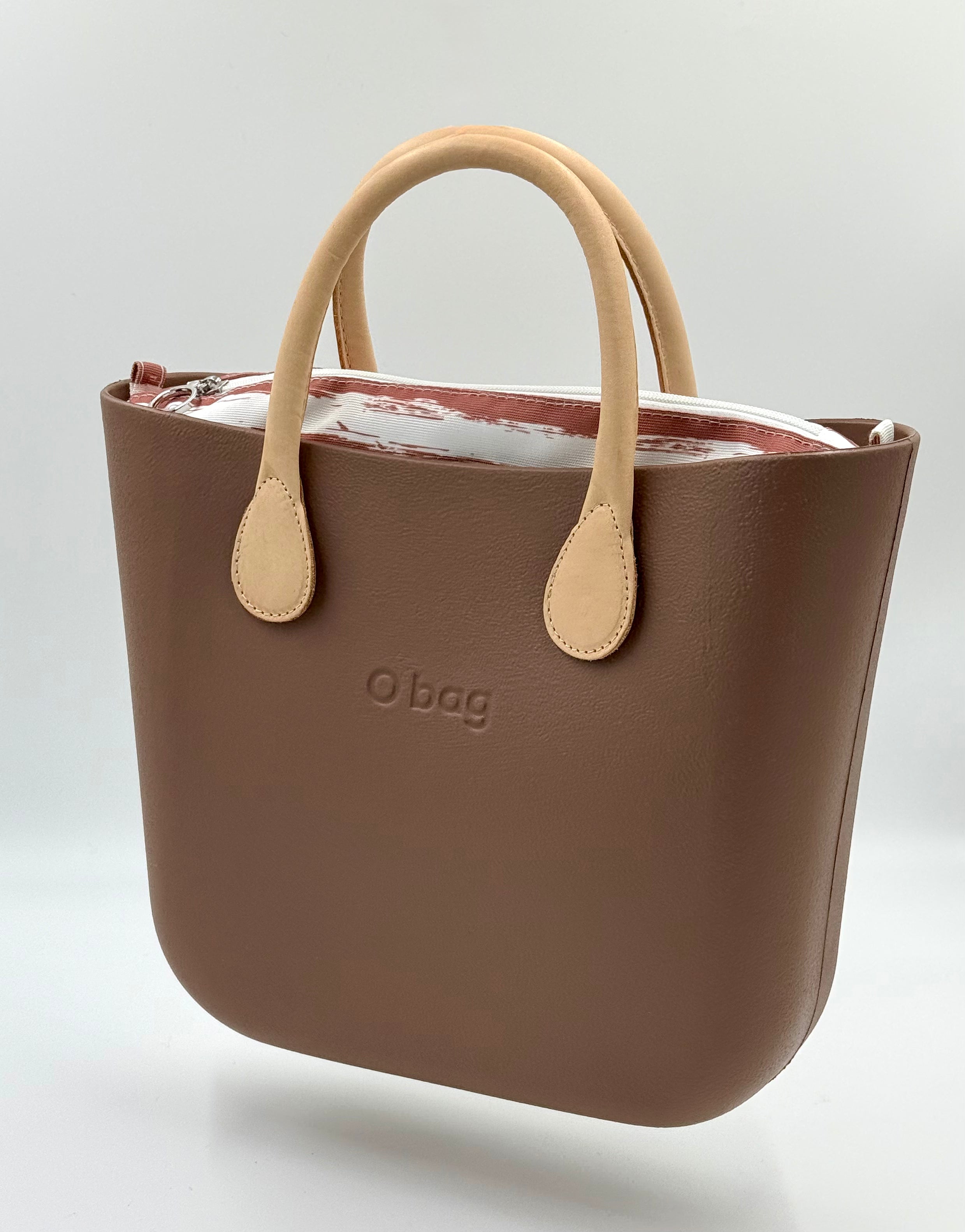 O bag Mini – taupe (greige) handbag with cream handles, striped zippered lining